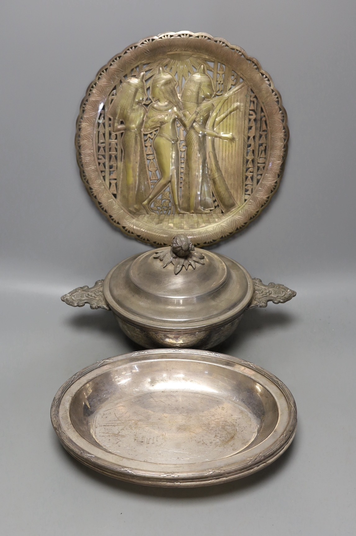 A set of four Christofle plated serving dishes, a similar ecuelle and cover and an Egyptian plated dish.